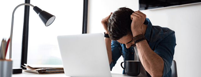 office employee displaying signs of poor mental health at work