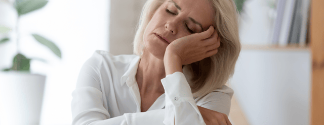 female employee experiencing symptoms of the menopause at work