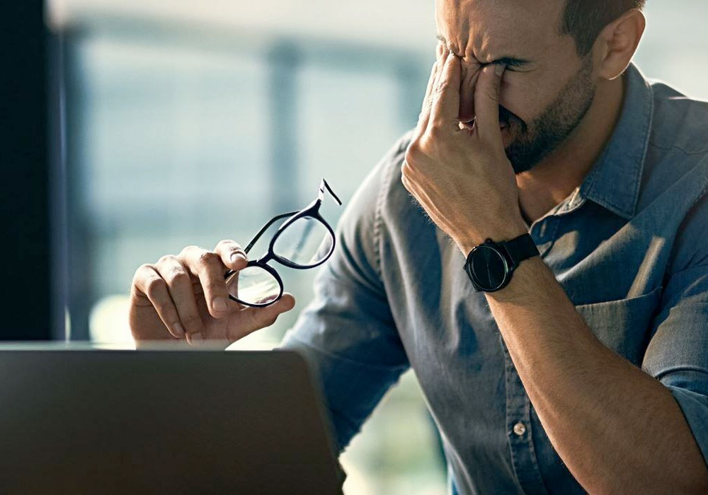 young lawyer suffering stress at work