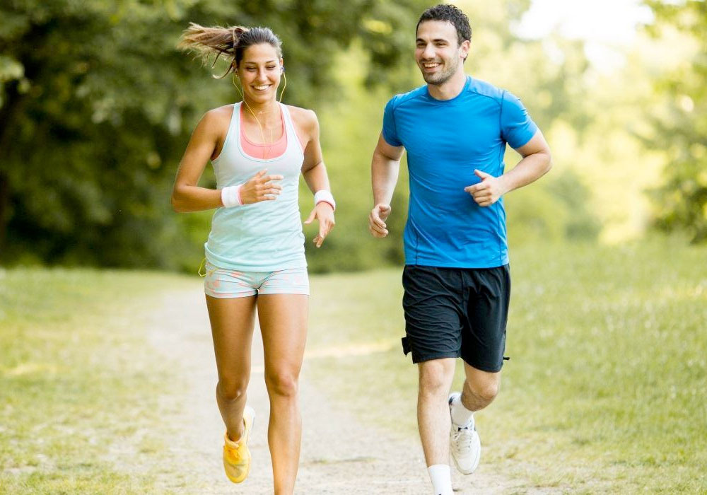 two joggers enjoying an outdoor run